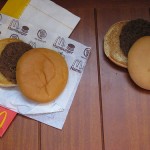 A photo of two McDonald's burgers, one 14 years old and looks new